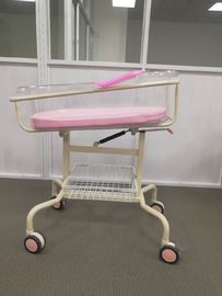 ピンクの移動式折畳み式ベッドの病院のベビー ベッド、ABS洗面器が付いている新生の病院のベビー ベッド